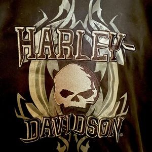 Black short sleeve button up Harley Davidson shirt.